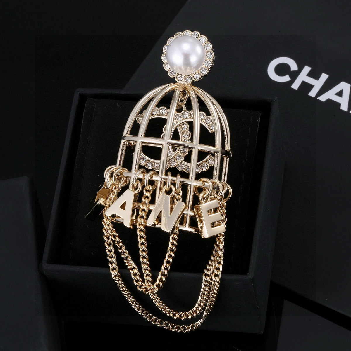 gold crystal letter Brooch for women - product detail view
