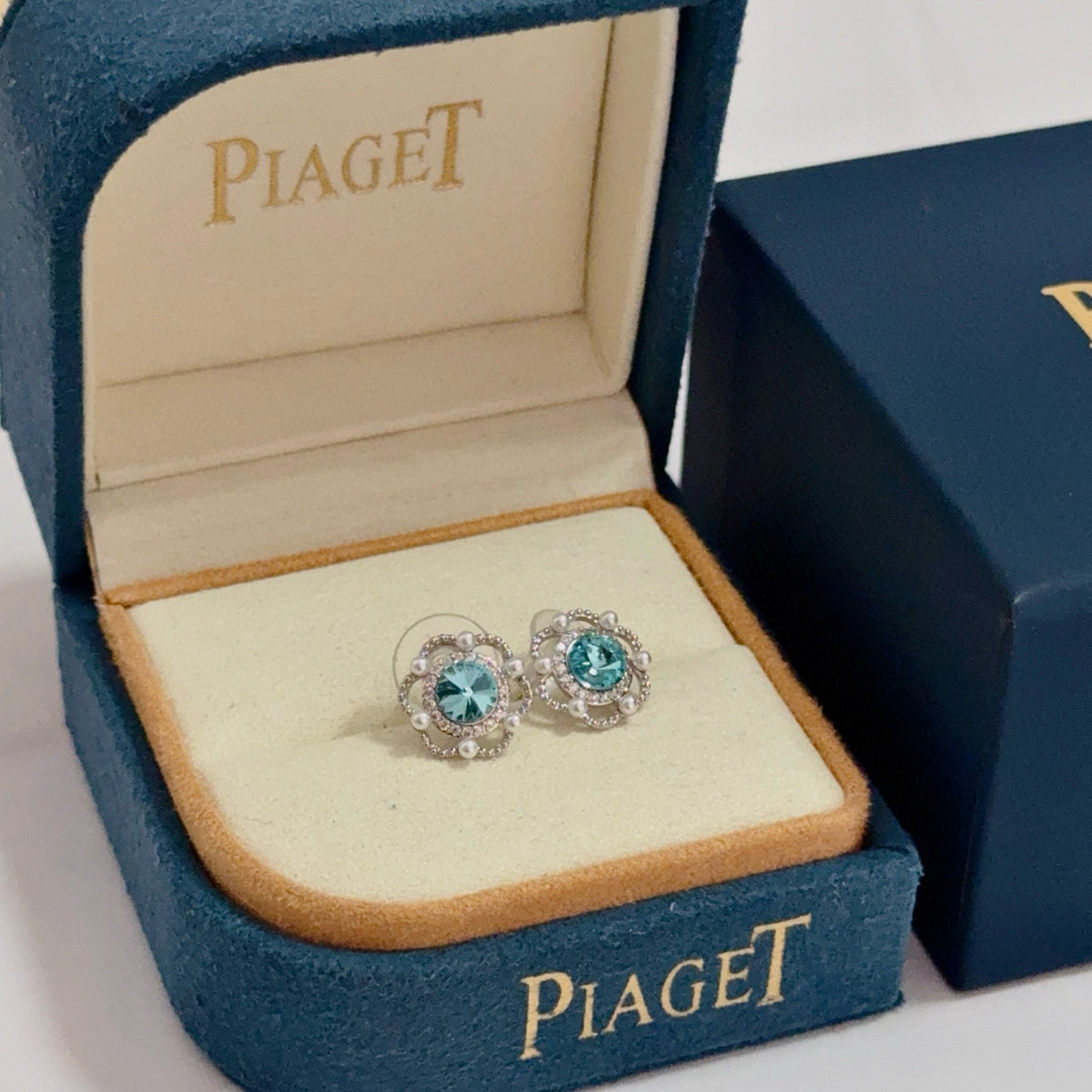 gold crystal inlaid Stud Earrings for women - product detail view