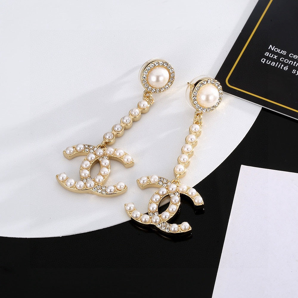 yellow brass Stud Earrings for women - product detail view