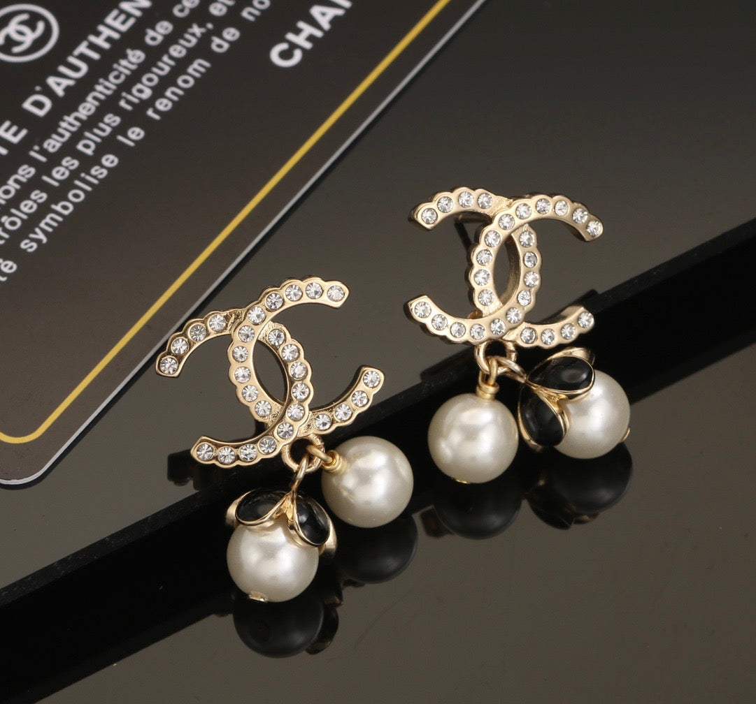 gold letter Stud Earrings for women - product detail view