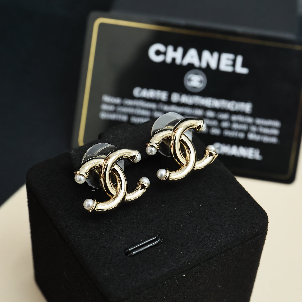 gold pearl double c Stud Earrings for women - alternate angle view 6