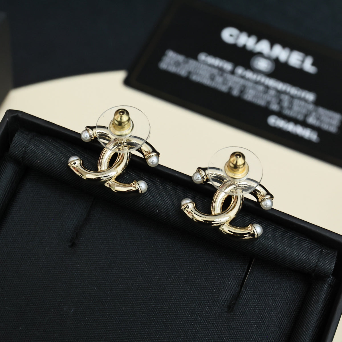 gold pearl double c Stud Earrings for women - alternate angle view 3