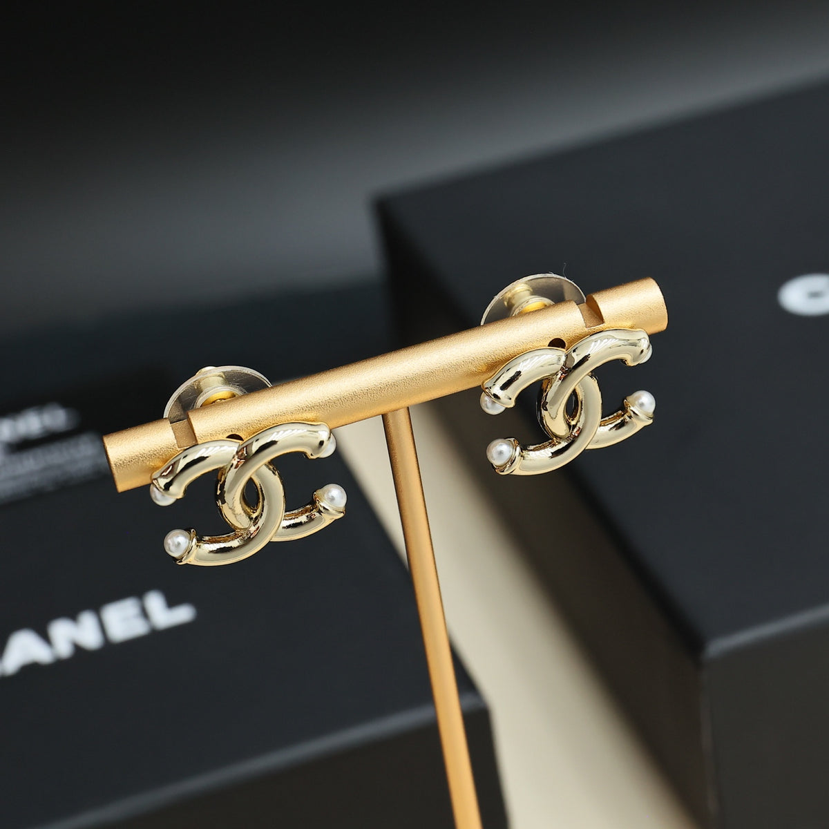 gold pearl double c Stud Earrings for women - product detail view