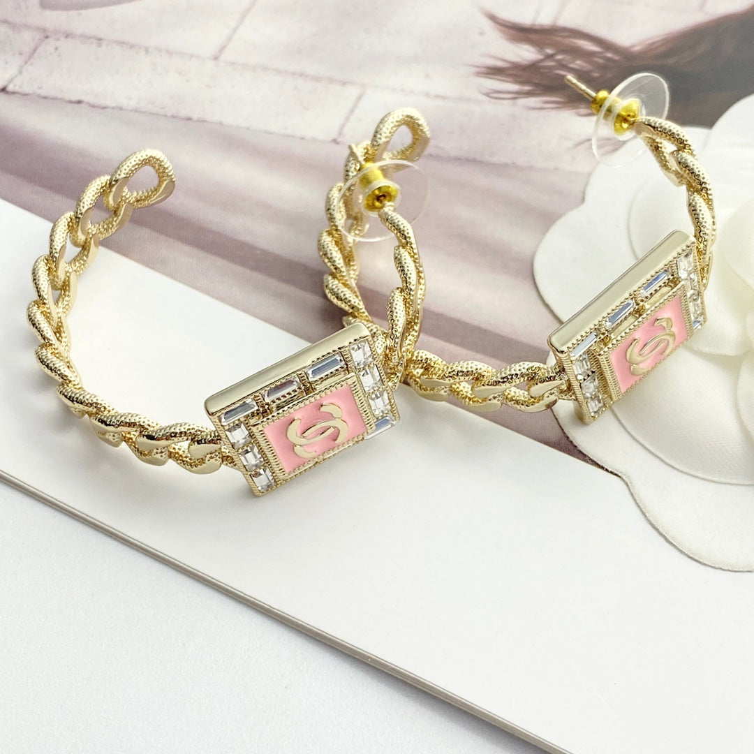 pink crystal inlaid Stud Earrings for women - product detail view
