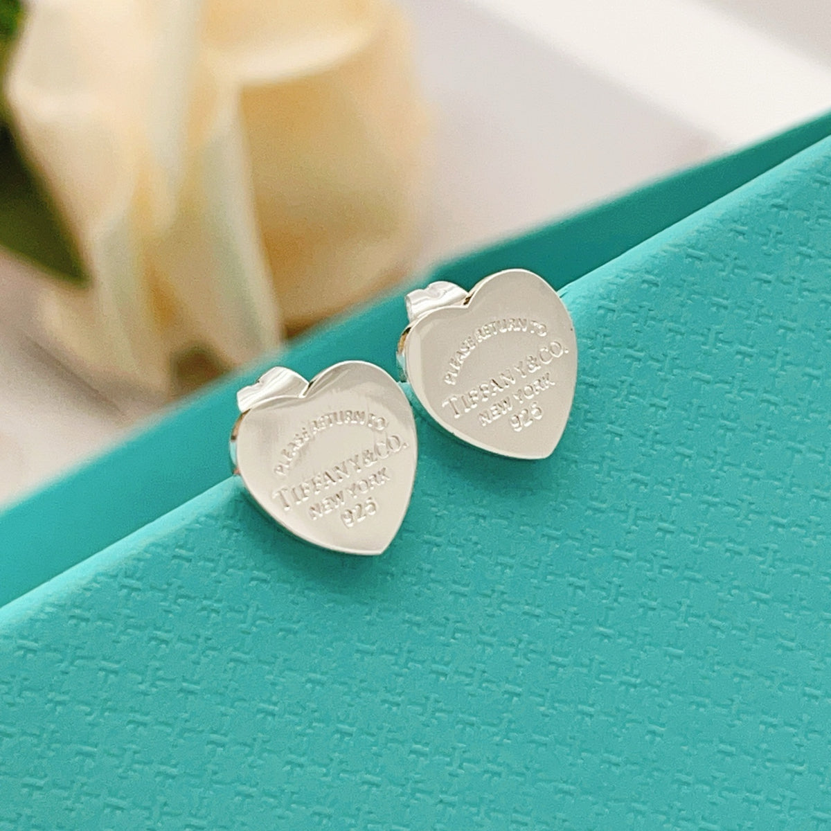 silver brass heart Stud Earrings for women - product detail view