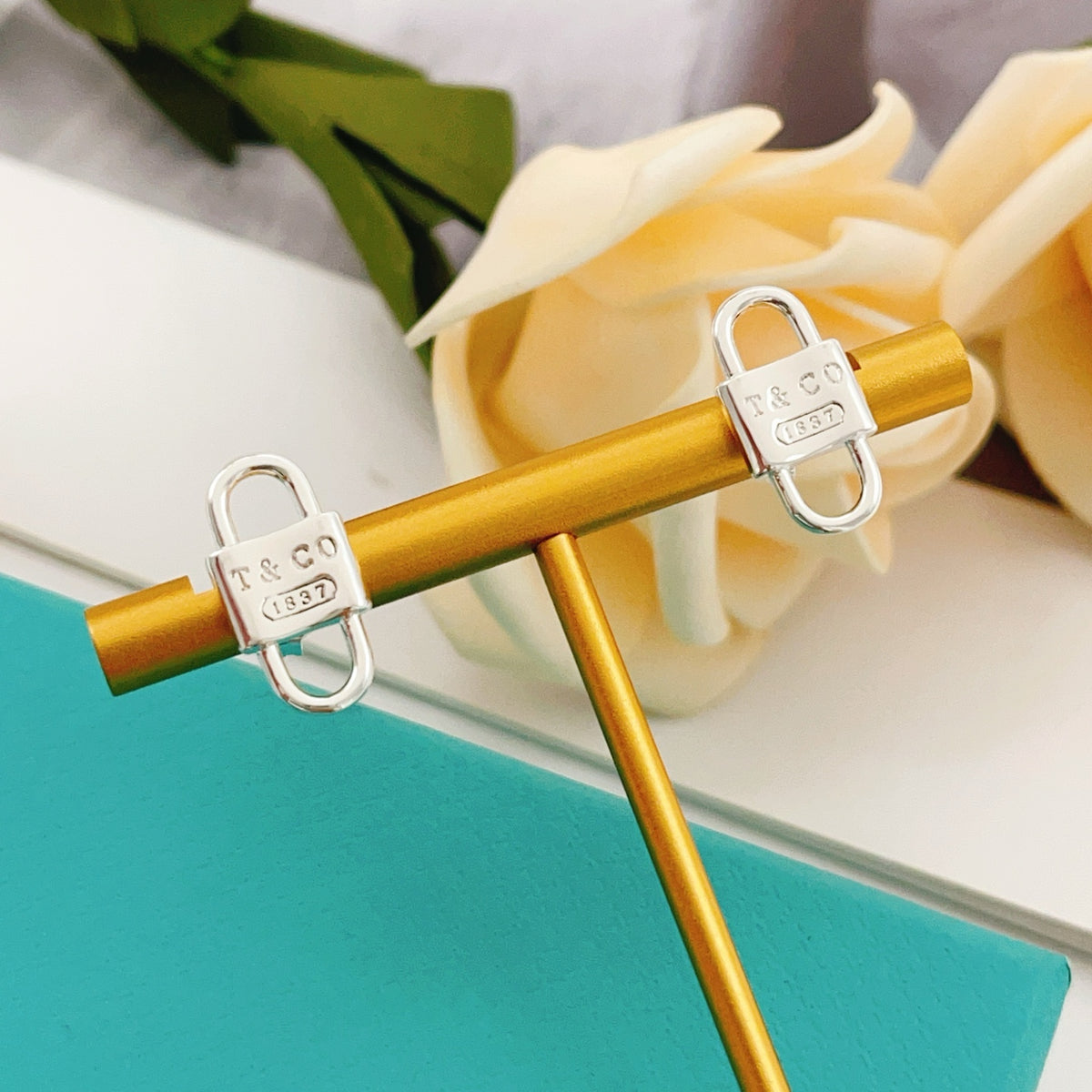silver brass luxury Stud Earrings for women - alternate angle view 4