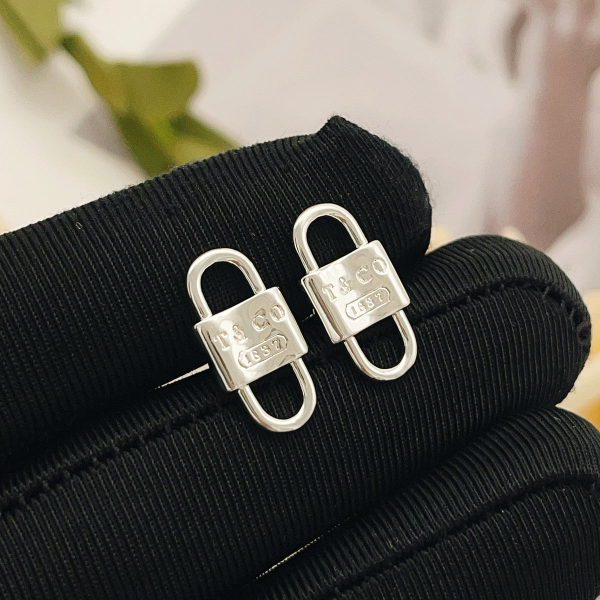 silver brass luxury Stud Earrings for women - alternate angle view 3