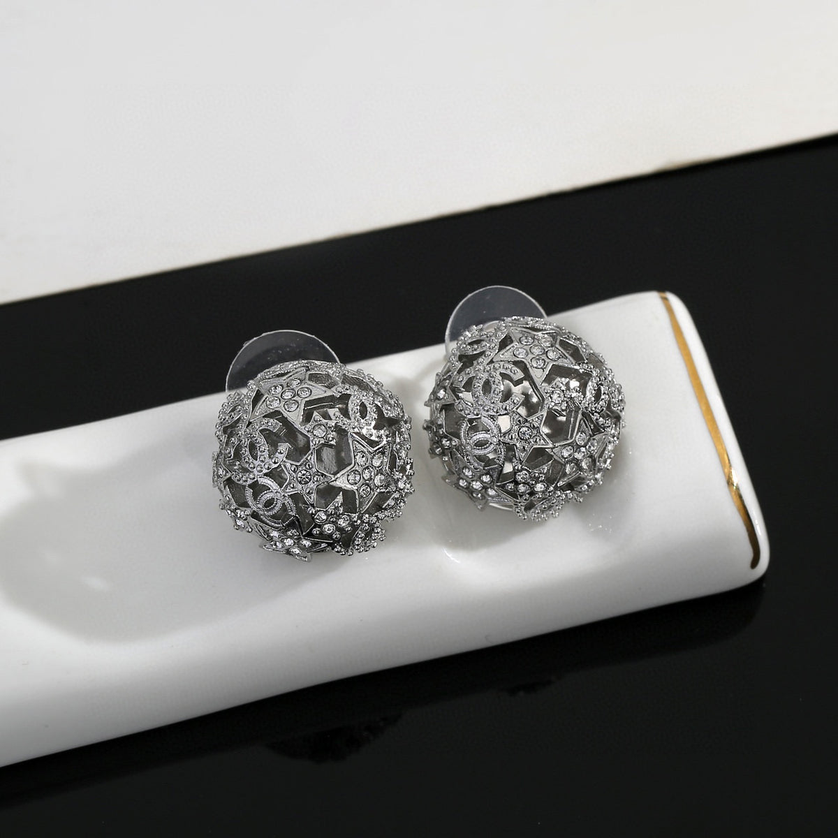 yellow brass hollow Stud Earrings for women - alternate angle view 5