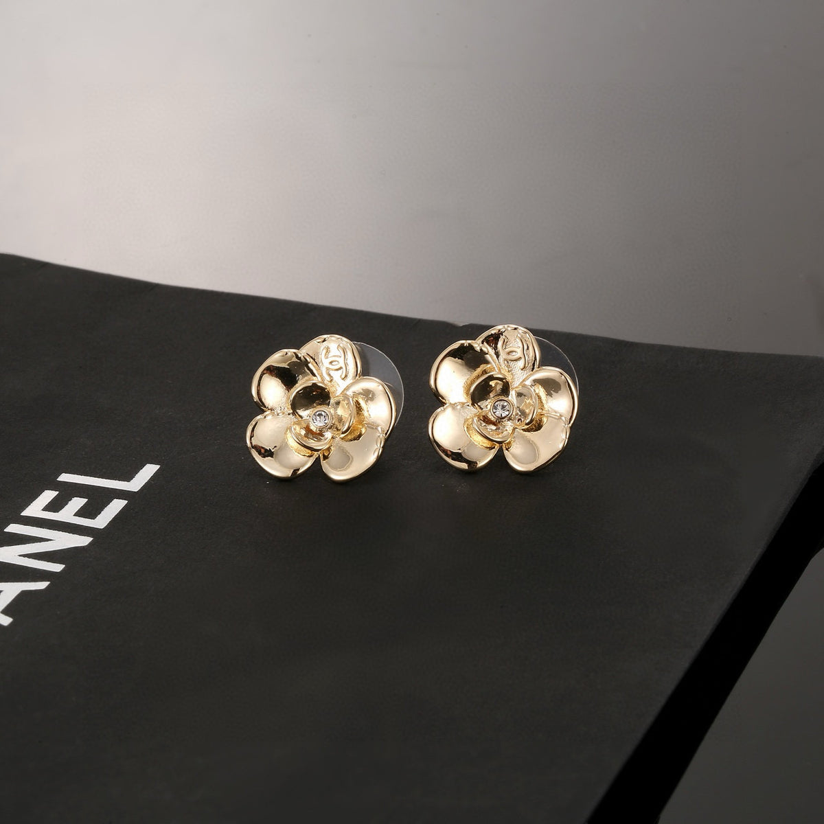 gold resin floral Stud Earrings for women - alternate angle view 6