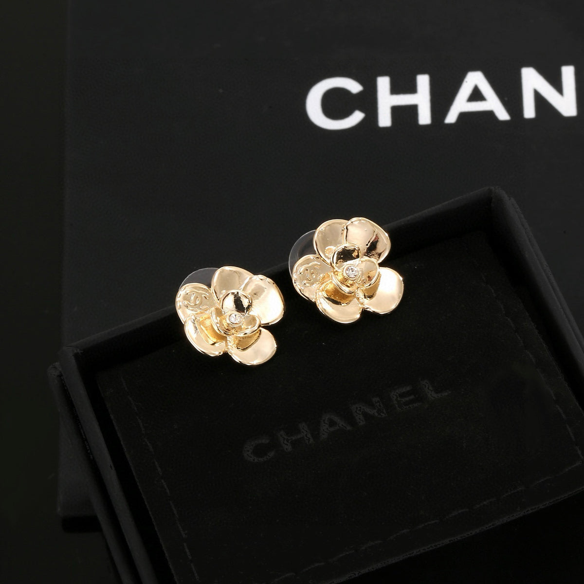 gold resin floral Stud Earrings for women - product detail view