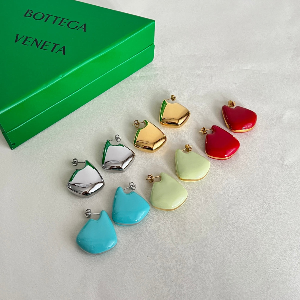 gold metal stylish Stud Earrings for women - alternate angle view 3