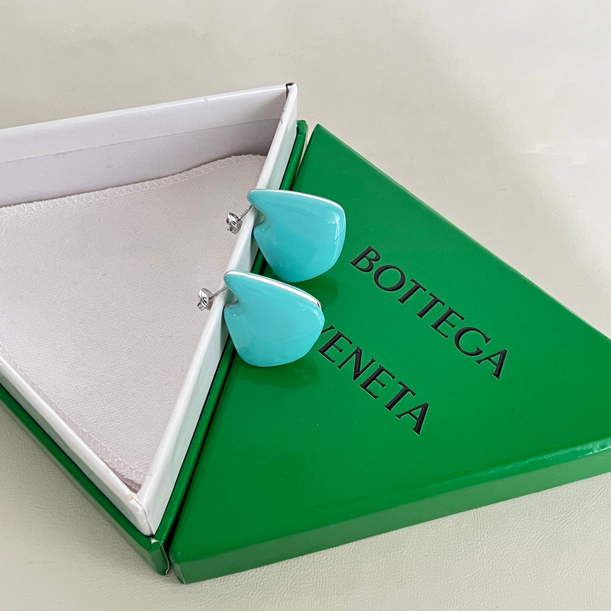 gold metal stylish Stud Earrings for women - alternate angle view 2
