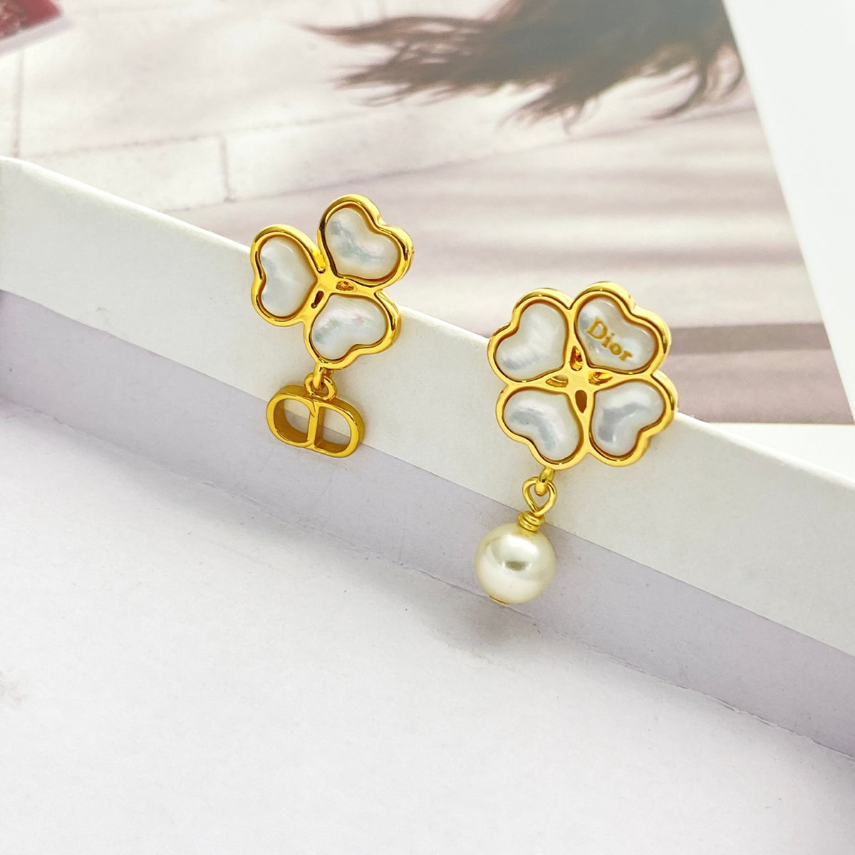 gold pearl clover Stud Earrings for women - product detail view