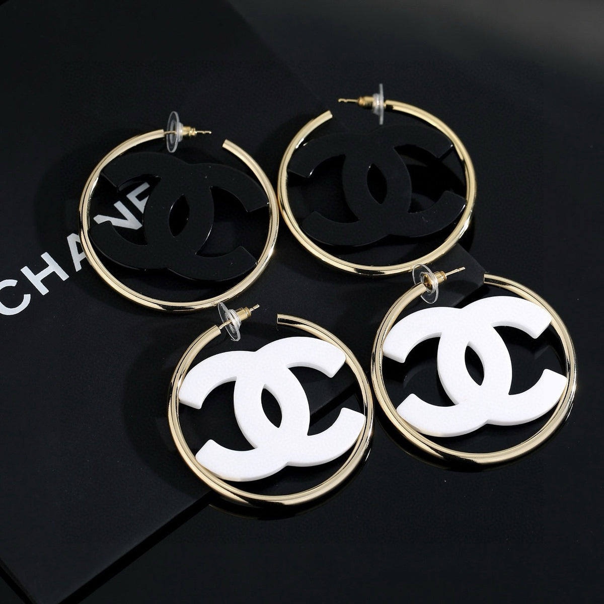 black and white acrylic luxury Stud Earrings for women - product detail view