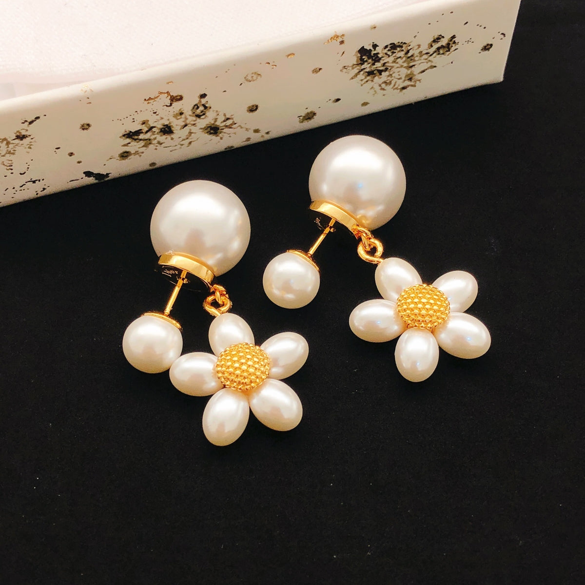 yellow brass floral Stud Earrings for women - alternate angle view 3